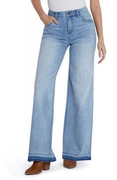 Released hems add a trend-right detail to these vintage-inspired, full-length, wide-leg jeans made with a hint of comfy stretch. 32" inseam; 23 1/2" leg opening; 10 1/2" front rise Zip fly with button closure Five-pocket style 66% cotton, 22% REPREVE® recycled polyester, 8% polyester, 3% rayon, 1% spandex REPREVE recycled polyester is made from 100% post-consumer recycled plastic bottles Machine wash, tumble dry Imported Washed Wide Leg Flare Jeans In Cotton, Medium Wash Cotton Wide-leg Flare Jeans, Wide Leg Washed Blue Cotton Flare Jeans, Washed Blue Wide Leg Cotton Flare Jeans, Washed Blue Wide-leg Cotton Flare Jeans, Blue Wide Leg Flare Jeans With Frayed Hem, Washed Blue Cotton Wide-leg Flare Jeans, Medium Wash Wide Leg Cotton Flare Jeans, High Rise Light Wash Cotton Wide Leg Pants