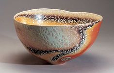 a close up of a bowl on a table