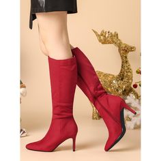 The knee-high silhouette and faux suede material of these boots give them a contemporary appeal. They feature a pointed toe and cylindrical heel, making them suitable for dressing up in both casual and work outfits. These sophisticated chic red knee-high boots have a sleek pointy toe and are made of faux suede. They have a stiletto heel, a side zip, and a rubber outsole. The heel is made of ABS and measures 3 1/3 inches, while the shaft height is 14 3/8 inches. Fitted Mid-calf Heeled Boots For Party, Party Mid-calf Boots For Fall, Mid-calf Boots For Fall Party, Mid-calf Heeled Boots For Party In Fall, Winter Suede Mid-calf Boots With Pointed Toe, Mid-calf Heeled Boots For Winter Party, Winter Mid-calf Boots With High Shaft, Trendy Knee-length Party Boots, Trendy Knee-length Boots For Party