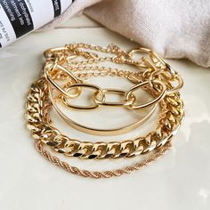 Whether worn alone or layered together, these shimmering bracelets are great for lending a whimsically-golden air to your ensemble. Includes four bracelets Bracelet 1: 2.36" diameter Bracelet 2: 7.48" L Bracelet 3: 6.61" L Bracelet 4: 7.48" L Lobster claw clasp 18k gold-plated copper Cheap Bracelets, Girlfriend Anniversary, Festival Birthday, Beach Festival, Anniversary Jewelry, Bracelet Online, Star Moon, Platinum Metal, Layered Bracelets