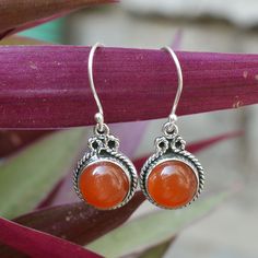 Carnelian Earrings, 925 Sterling Silver, Red Carnelian 10 MM Round Gemstone Earrings, Silver Earrings, Boho Earrings, Beautiful Earrings ---------------------------------------------------------------------------------------------------------------------------------------------------- Metal: Solid 925 Sterling Silver Style: Earrings Stone Detail : Natural Carnelian Size 10x10mm Round Cabochon Weight- 5.55 Grams Approx ------------------------------------------------------------------------------ Amber Carnelian Gemstone Earrings, Round Carnelian Earrings, Orange Gemstone Sterling Silver Earrings, Carnelian Gemstone Round Earrings, Round Carnelian Gemstone Earrings, Orange Round Sterling Silver Earrings, Silver Carnelian Earrings, Silver Round Carnelian Earrings, Orange Carnelian Gemstone Earrings