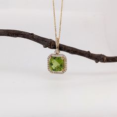 Peridots feature a gorgeous unique shade of vibrant green and beautiful clarity with an amazing sparkle. This pendant makes a stunning statement piece made in 14k gold that will elevate any outfit! This pendant is made with solid 14k Gold and natural Earth mined SI / G-H diamonds. As listed, this pendant is ready to ship. If you're interested in purchasing this setting with a different center stone please message us! Luxury Yellow Gold Peridot Jewelry, Fine Jewelry Green Necklace With Diamond Accents, Fine Jewelry Green Necklaces With Diamond Accents, Green 14k Gold Necklace With Diamond Accents, 14k Gold Green Necklace With Diamond Accents, Green Pendant Necklace With Diamond Accents, Elegant Lime Green Diamond Jewelry, Green Diamond-cut 14k Gold Necklace, Fine Jewelry In Green Peridot