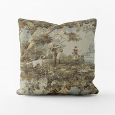 a decorative pillow with an image of people and animals in the woods, on a white background