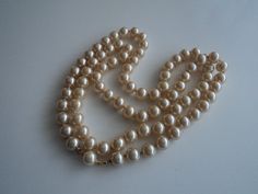 Vintage faux pearl signet Pat gold tone clasp, 72 cm long, beads- 0.7 cm each Classic Gold Beaded Necklaces For Formal Occasions, Classic Gold Beaded Necklace For Formal Occasions, Formal Cream Beaded Necklaces, Formal Cream Beaded Necklace, Small Pearl Necklace, Gold Pearl Necklace, Pearl Brooch, Faux Pearl Necklace, Bracelet Clasps