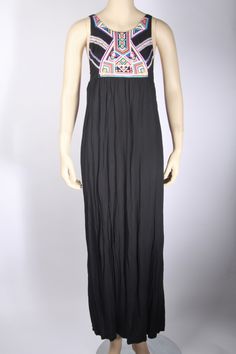 Great Pre-owned Condition Size: X-Small Color: Black Relaxed Fit Elastic Back Dropped Armhole Boho Bodice detail with Embroidered Arrows Detail Adjustable Spaghetti Straps 100% Viscose Hand Washing Recommended Casual Summer Maxi Dress With Embroidered Hem, Casual Embroidered Maxi Dress For Vacation, Casual Maxi Dress With Embroidered Hem, Black Floral Embroidered Beach Maxi Dress, Casual Maxi Dress With Floral Embroidery, Casual Floral Embroidered Maxi Dress, Casual Embroidered Cotton Maxi Dress, Casual Maxi Embroidered Dress With Floral Detail, Casual Cotton Maxi Dress With Floral Embroidery