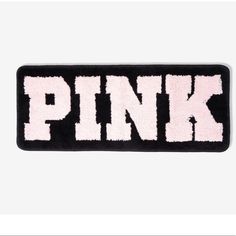 the pink logo is shown on a black and white patch that says,'pink '