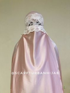 This amazing blush pink outfit consists of 2 parts - a long khimar and a long niqab. both parts made of soft silk, the frontal part is made of jersey . the peculiarity of our hijabs and the fact that they do not need to be tied up, they hold fast thanks to this fabric. the cut for eyes is decorated with a lace. This suit looks very elegant and will suit those who prefer the most closed style of cover. We accept custom orders and can change everything like you wanted, please contact us! At variou Blush Pink Outfit, Satin Abaya, Silk Hijab, Girls Hijab, Niqab Fashion, Stylish Hijab, Hold Fast, Islamic Dress, Muslim Fashion Hijab