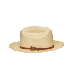 Expertly crafted from genuine Panama straw, the JAYLEE hat boasts a natural color and a 2.75 inch brim. The included brown buckle adds a touch of sophistication to this timeless accessory. Stay cool and chic in the heat with the JAYLEE hat. Brown Straw Panama Hat With Curved Brim, Brown Straw Hat With Short Brim, Short Brim Brown Straw Hat, Brown Toquilla Straw Fedora, Brown Short Brim Straw Hat, Classic Brown Wide Brim Boater Hat, Classic Adjustable Sun Hat With Single Vent, Classic Adjustable Boater Hat For Country Events, Elegant Summer Fedora For Rodeo