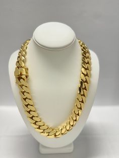 Indulge in the timeless elegance of our Cuban link chains and bracelets, meticulously handcrafted to perfection. Each piece is a solid statement of craftsmanship, created with passion and precision. Our Cuban link collection is plated not once, not twice, but five times with a lavish 14K Gold polish, ensuring a radiant and opulent finish that exudes sophistication. Embrace the uniqueness of handmade jewelry, where each link is carefully assembled to create a one-of-a-kind masterpiece. Our commitment to craftsmanship ensures that every detail is thoughtfully considered, providing you with a timeless accessory that stands the test of time. Please note that the artisanal nature of our creations means that some pieces may take up to 4 weeks to be crafted with the utmost care. Additionally, as Luxury Gold Cuban Link Bracelet Iced Out, Luxury Jewelry Cuban Link With Solid Construction, Luxury Diamond Cuban Link Necklace With Curb Chain, Luxury White Gold Cuban Link Necklaces, Luxury White Gold Cuban Link Chain Necklace, Luxury Silver Cuban Link Jewelry, Luxury Cuban Link Jewelry With Pave Setting, Luxury White Cuban Link Necklace With Curb Chain, Cheap Men's Cuban Link Chain Necklace