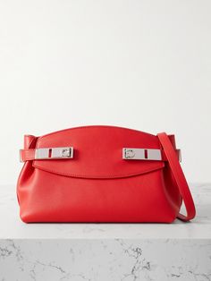 Ferragamo's shoulder bag is named after the way its 'Gancini' buckled tabs gently 'Hug' the sides. Made in Italy from red leather, it has an adjustable strap that detaches so you can carry it as a clutch. There's plenty of space inside to fit your keys, phone and cosmetics, plus internal slip pockets for your most-used cards. Eyewear Shop, Red Accessories, Sport Swimwear, Jo Malone London, Boot Pumps, Small Shoulder Bag, Clothes Collection, Salvatore Ferragamo, Bag Making