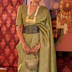 Olive Green colored saree is made from art silk fabric which is highlighted with beautiful floral weaving work as shown. comes along unstitched art silk blouse piece which you can customise as per your design/style. Occasion - You can wear this saree for festivals, parties, event and ideal for any fashionista. Note:- The actual product may differ slightly in color and design from the one illustrated in the images when compared with computer or mobile screen. Elegant Green Banarasi Silk Blouse Piece, Elegant Green Handloom Pre-draped Saree, Elegant Green Saree For Puja, Elegant Green Pre-draped Saree For Puja, Elegant Paithani Silk Pre-draped Saree For Designer Wear, Elegant Handloom Dola Silk Lehenga, Elegant Handloom Dola Silk Pre-draped Saree, Designer Wear Saree With Traditional Patterns For Navratri, Elegant Designer Paithani Silk Lehenga