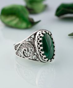 Malachite Silver Statement Ring 925 Sterling Silver Artisan Made Handcrafted Boho Filigree Cocktail Ring Handmade Women Jewelry, gift ring for her Material: 925 Sterling Silver ( NICKEL FREE ) Gemstone: Malachite 7x14 mm FREE, FAST AND TRACKABLE SHIPPING FOR ALL EU COUNTRIES AND USA. COMES WİTH VELVET POUCH AND LUXURY GİFT BOX. Show off this gorgeous green stone ring at any occasion. This eye catching ring is perfect to add glam to any outfit with Malachite Gemstone. This vintage, original, and stylish luxury jewelry is perfect for wearing at parties, festivals and everyday life.  Our handmade pieces are the perfect gift ring for her, mom, wife, daughter, friend, lover, relative, etc. ideal gift for birthday, anniversary, christmas, graduation, and mothers day, valentines, or any other spe Filigree Ring For May Birthstone Gift, May Birthstone Filigree Ring Gift, Green Sterling Silver Filigree Ring, Ornate Green Rings For Gifts, Green Rings With Intricate Design For Gift, Green Jewelry With Intricate Design For Gift, Ornate Green Rings As Gift, Intricate Green Jewelry For Gift, Traditional Green Sterling Silver Rings