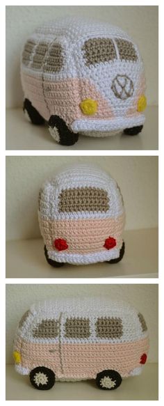 crocheted toy bus sitting on top of a white table next to another vehicle