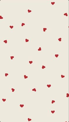 red hearts are flying in the air against a white background with black dots on it