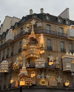 a building with christmas decorations on the top