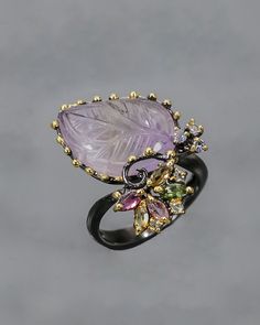 This stunning ring is made from 925 sterling silver and plated with Black Rhodium & Gold. Main stone is beatiful bi-color Ametrine in leaf shape and Tourmaline. ♥ Please note as with all natural gemstones the color and inclusions may vary slightly from the pair shown. ♥ Each order will be gift wrapped beautifully ♥ QUALITY: Each item is stamped according to US regulations. ➤ Orders of $550 and more will be qualified for free UPS International Express shipping (2-3 days). ------------ *DIMENS Exquisite Amethyst Rings With Gemstone Accents, Luxury Amethyst Ring Jewelry, Elegant Amethyst Crystal Ring With Gemstone Accents, Elegant Handmade Amethyst Gemstones, Exquisite Handmade Rings As A Gift, Exquisite Silver Amethyst Gemstone Ring, Exquisite Multi-stone Amethyst Jewelry, Elegant Multi-stone Amethyst Ring Gift, Exquisite Jewelry Ring With Accent Stones