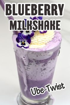 A glass of blueberry milkshake with an ube twist, topped with whipped cream and edible flowers. Ube Milkshake, Keto Frappuccino, Blueberry Milkshake, Blueberry Milk, Sweet Potato Powder, Keto Shakes, Nut Milk Bag, Banana Milkshake