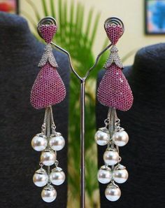 You will get same as you seen in the picture. Please have a look other things. Thanks Party Pearl Earrings, Glamorous Dangle Pearl Earrings For Party, Glamorous Pearl Drop Earrings For Party, Red Pearl Earrings For Party, Pink Metal Earrings For Formal Occasions, Trendy Silver Pearl Earrings For Wedding, Formal Pink Metal Earrings, Elegant Pink Drop Earrings Danglers, Elegant Pink Chandelier Earrings For Party