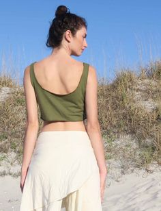 Style – The Utility tank is a basic scoop neckline in front and back that is highly functional. Shape – The Simplicity follows the shape of the torso, opening up into a simple A-line design at the hip. Size – Order based on your BUST measurement Fabric Shown – Light Hemp/Organic Cotton Knit Color Shown – Spinach Fitted Spring Tank Top With Scoop Back, Spring Stretch Tops With Low Back, Fitted Top With Scoop Back And Bra-friendly Design, Fitted Top With Scoop Back And Bra Friendly, Fitted Scoop Back Tank Top For Spring, Fitted Bra Friendly Tops With Scoop Back, Fitted Bra-friendly Top With Scoop Back, Fitted Scoop Back Top, Bra Friendly, Spring Low Back Stretch Tops