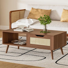 a living room with a white couch and wooden coffee table