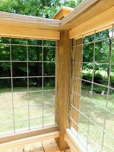 the inside of a window with wood and glass