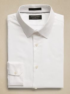 WRINKLE RESISTANT: No need to iron, these soft, cotton dress shirts are specially engineered to resist wrinkles so it stays looking crisp and pulled-together. Spread collar. Long sleeves with adjustable double-button barrel cuffs and button vents. Clean front. Shirttail hem. Made exclusively for Banana Republic Factory. #801243 Soft Cotton Dress, Slim Dress, Banana Republic Factory, Slim Dresses, Dress Shirts, Cotton Dress, Cotton Dresses, Dress Shirt, Wrinkles