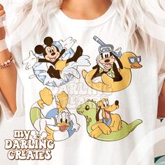 a woman wearing mickey mouse tshirt with other disney characters on her t - shirt