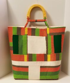 "Kente Cloth Bag | 100% Cotton Bag | Oversized Handbag | Boho Bag | Handcrafted Block Bag | Weekend Bag | Handmade | Block Fabric Bag | Gift Bright and Bold describes this boho oversize bag. This patchwork design large tote is perfect for any occasion. Custom designed handles set the tone along with two large inner pockets. Traditional African 100% cotton has a new look. Excited to introduce you all to my new \"Oversize Bag Collection. Handmade in a SMOKE-FREE and PET-FREE home. Proud to say it Oversized Handbag, Oversized Handbags, Kente Cloth, Oversized Bag, Sac Week End, Weekend Bag, Cloth Bag, Bag Collection, Boho Bag