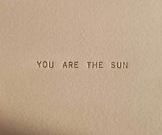 an old typewriter with the words you are the sun printed on it's side