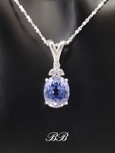 Made to order. Please allow up to 3 weeks for the production of your necklace. This listing is for a 925 non-plated sterling silver necklace set with a 10x8mm lab created ceylon sapphire center stone with cubic zirconia diamond accent stones. Comes with a 1mm twisted serpentine chain in either 16" or 18" length. Listing photos and video show the 10x8mm size sapphire. Available Sapphire Sizes 10x8mm (2.5 carat approximately) 12x10mm (5 carat approximately) 14x10mm (6 carat approximately) Main Gem Sapphire Necklace With Prong Setting In Sterling Silver, Formal Sterling Silver Necklace With Center Stone, Silver Necklace With Lab-created Sapphire In Prong Setting, Silver Necklace With Prong-set Lab-created Sapphire, Classic Blue Necklace With Accent Stones, Classic Blue Necklaces With Accent Stones, Classic Oval Tanzanite Necklaces, Classic Oval Tanzanite Necklace, Silver Sapphire Necklace With Accent Stones