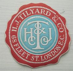 a red and blue seal with the words, it's tiyard & co on it