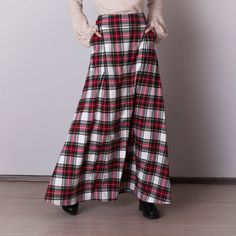 White plaid skirt: - Side seam pockets - Hidden zipper on the back - Lined belted part - Classic tartan pattern - Fabric is 40% wool, 58% polyviscose, 2% of elastane Model is 6'2'', she wears US 8 size US 0  Bust 82 cm (32.5 inches) Waist 64 cm (25 inches) Hips 89 cm (35 inches) US 2  Bust 85 cm (33.5 inches) Waist 66 cm (26 inches) Hips 92 cm (36 inches) US 4  Bust 88 cm (34.5 inches) Waist 68 cm (27 inches) Hips 94 cm (37 inches)  US 6  Bust 90 cm (35.5 inches) Waist 71 cm (28 inches) Hips 96 cm (38 inches)  US 8  Bust 93 cm (36.5 inches) Waist 74 cm (29 inches) Hips 99 cm (39 inches) US 10  Bust 95 cm (37.5 inches) Waist 76 cm (30 inches) Hips 102 cm (40 inches) US 12  Bust 99 cm (39 inches) Waist 80 cm (31.5 inches) Hips 105 cm (41.5 inches) US 14  Bust 103 cm (40.5 inches) Waist 84 cm Plaid Lined Skirt For Winter, Plaid Full Skirt With Lining, Plaid Skirt With Pockets For Winter, Scottish Plaid Skirt For Winter, Winter Scottish Plaid Skirt, Plaid Skirt With Pockets, Scottish Style Plaid Winter Bottoms, Tartan Skirt Women, Christmas Outfit Women