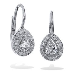 Two pear-shaped diamonds, with a total weight of 0.41 carat (F/G/SI), are set at the center and embraced by thirty-two pave-set diamonds with a total weight of 0.10 carat (G/H/VS) in these handmade 18 karat white gold lever-back earrings. Give her a gift as timeless as your love. SKU: 17626 Formal Pear-shaped Diamond Earrings With Single Cut Diamonds, Formal Teardrop Single Cut Diamond Earrings, Classic Pear-shaped Diamond Earrings With Single Cut, Luxury Pear-shaped Diamond Earrings With Pave Setting, Platinum Pear-shaped Diamond Earrings With Prong Setting, Anniversary Pear-shaped Single Cut Diamond Earrings, Pear-shaped Diamond Earrings With Single Cut For Anniversary, Pear-shaped Brilliant Cut Diamond Earrings, Luxury Diamond White Brilliant Cut Teardrop Earrings