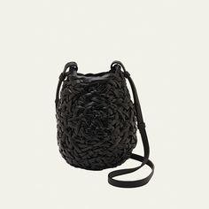 Loewe "Nest" basket bucket bag in woven leather  Adjustable shoulder strap  Open top  Approx. 7.4"H x 7.4"W x 6.6"D Made in Spain Modern Woven Leather Bucket Bag, Summer Bucket Bag With Intrecciato Weave, Modern Crossbody Bucket Bag In Woven Leather, Modern Woven Leather Crossbody Bucket Bag, Casual Bucket Bag With Intrecciato Weave, Leather Straw Bag With Intrecciato Weave, Luxury Bucket Bag With Intrecciato Weave, Evening Bucket Shoulder Bag With Intrecciato Weave, Daily Use Bucket Bag With Intrecciato Weave