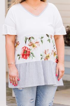 Get ready to add some unpredictable charm to your wardrobe with this top! This ivory top features a unique floral stripe color block design and is made from lightweight fabric! Pair it with your go-to denim or pants for a playful and stylish look! 95% Rayon, 5% Spandex Spring Cotton Blouse With Striped Sleeves, Casual Blouse With Striped Sleeves For Spring, White Tops With Striped Hem For Spring, White Striped Hem Tops For Spring, White Cotton Tops With Floral Patchwork, Chic White Tops With Striped Sleeves, Spring Short Sleeve Top With Striped Hem, Spring Short Sleeve Tops With Striped Sleeves, Spring Tops With Striped Short Sleeves