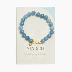 Details Freshly Picked Birthstone Bracelets help you remember the month you fell in love with your baby! Wear this bracelet as a bond between your soul and theirs. The March Birthstone Bracelet features aquamarine semi-precious stone beads to symbolize protection, joy, and health. Made with easy-to-wear elastic, each bracelet includes three gold moon phase charms to represent the women who came before you, the woman you are today, and the mom you hope to be. Get yours today! Features 8mm semi-pr Birthstone Beaded Bracelets, Light Blue Gemstone Bracelets As Gift, Inspirational Blue Beaded Bracelets For Gifts, Inspirational Blue Bracelets For Gifts, Stone Beads Bracelets, Healing Beaded Bracelets With Round Beads For Mother's Day, Adjustable Aquamarine Beaded Bracelet As Gift, Adjustable Aquamarine Beaded Bracelets As Gifts, Light Blue Gemstone Beaded Bracelets For Gifts