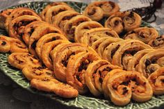 there are many pieces of food on the plate and one is cut in half to look like spirals