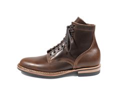 The MP honors our long and proud history of shoeing military men. Modeled after American infantry boots during WWII, but updated with a sleek one-piece backstay, this stylish boot boasts the durability and longevity of its heavy armored namesake with the chiseled jaw and cap-toe of a high end street boot, for a combination of old world quality and new world swagger unavailable anywhere else on the market. Take it to the field, or wear it on the streets: the M1 will outlast the competition. Model Classic High-top Oiled Leather Work Boots, Classic Oiled Leather Boots With Vibram Sole, Classic Waterproof Boots With Rubber Sole And Oiled Leather, Classic Boots With Vibram Sole And Oiled Leather, Vintage Oiled Leather Boots With Waxed Finish, Vintage Boots With Waxed Finish And Round Toe, Goodyear Welted Oiled Leather Work Boots, Vintage Waxed Finish Plain Toe Boots, Vintage Moc Toe Boots With Waxed Finish