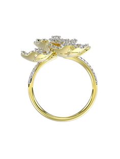 a yellow and white gold ring with flowers on the side, surrounded by small diamonds