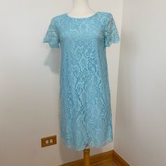 Baby Blue Color Beautiful Lace Over Solid Lining Armpit To Armpit Is Approximately 16 Inches Across When Laying Flat Back Of Neck To Bottom Is Approximately 33 Inches Ynf 4454 (M) Ynf 4455 (S) Elegant Blue Lace Dress For Spring, Elegant Light Blue Lace Dress For Spring, Spring Party Light Blue Lace Dress, Blue Lace Knee-length Dress, Blue Short Sleeve Lace Dress For Summer, Blue Knee-length Lace Dress, Blue Lace Dress For Spring, Light Blue Shift Dress With Short Sleeves, Blue Lace Spring Dress