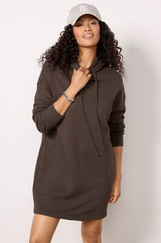 Elevate your weekend look with the Etta Sweatshirt Dress from Velvet. Crafted in a soft cotton fleece, this easy dress features an adjustable hoodie, side pockets, and a relaxed silhouette. You'll love it paired with your favorite sneakers and baseball hat. | VELVET Women's Etta Sweatshirt Dress, Size Large, Brown Hoodie Dress Outfit With Sneakers, Sweatshirt Dress Outfit Winter, Hoodie Dress Outfit, Sweatshirt Dress Outfit, Easy Dress, Velvet Clothes, Winter Dress Outfits, Holiday Party Dresses, Fashion 101