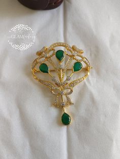 Beautiful Antique/Vintage style Pin/Brooch, base metal is guaranteed Pure Silver 925 and is real 18K Gold Filled which is very durable and will stay for years. Stones used are natural semi precious stone Green Onyx and Cubic Zirconia. Gold Filling is completely different from Gold Plating as gold filling contains 100% gold which does not go away easily and enhances the life and look of the jewelry. We used best quality Italian Pin mechanism for enhanced durability and comfortable wearing. Traditional Yellow Gold Brooches For Formal Occasions, Traditional Yellow Gold Formal Brooches, Traditional Yellow Gold Pendant Brooches, Traditional Hallmarked Brooch For Formal Occasions, Ceremonial Gold Brooches With 17 Jewels, Elegant Gold Filigree Brooches, Heirloom Gold Brooch With Intricate Design, Heirloom Gold Brooches With Intricate Design, Anniversary Yellow Gold Brooch With Intricate Design