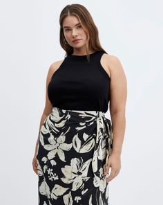 Cut to a classic straight silhouette, this midi wrap skirt from mango features, floral print, wrap design and back zip fastening. Wrap Midi Skirt, Midi Skirt Black, Midi Wrap Skirt, Christmas Nightwear, Joe Browns, Jean Jeggings, Floral Wraps, Black Midi Skirt, Linen Skirt