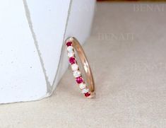 Exclusive to Benati Bridal. A stunning 3 stone multi color eternity band. Simple Gemstone Engagement Rings, Wedding Ring Ruby, Unique Ruby Rings, Ruby Ring Designs, Opal Wedding Ring, Opal Stacking Ring, Ruby Ring Vintage, Elegant Wedding Rings, Promise Band