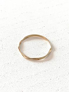 9k Solid Gold Ring width 1mm *Jewellery box included This piece is a minimalist beauty. It is solid gold and has quickly become a favourite in our collection. Our Solid Gold Twist Ring is the perfect gift for yourself or someone special that will stand the test of time. The solid gold boho ring is timeless and although dainty is good quality. It is delicate, very minimalist looking and makes the perfect statement. These items are fine pieces of jewellery, so please refer to taking care of your item with care. For example removing when sleeping, brushing hair, exercising etc.  We do not offer replacement, repair or exchange for any of our pieces. So please keep in mind this is a delicate/fine piece of jewellery. Jewellery | Personalised | Classic | Gift idea | Solid gold | jewelry | Real Go Gold Twist Ring, Boho Rings Gold, Real Gold Necklace, Dainty Jewellery, Minimalist Beauty, Gold Armband, Gold Charm Necklace, Twist Ring, Solid Gold Rings