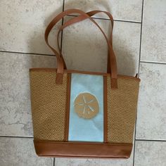 New Thirty One Bag! Perfect For The Beach Or As An Every Day Bag. Only Used A Handful Of Times. No Marks Or Stains. Still Has That Brand New Smell Hah! If You’ve Gotten A New Bag You Know Exactly What I’m Talking About! Tan Double Handle Bag For Vacation, Tan Double Handle Vacation Bag, Tan Tote Beach Bag, Casual Tan Straw Tote Bag, Tan Straw Tote Bag For Vacation, Tan Beach Bags With Leather Handles, Tan Beach Bag With Leather Handles, Blue Shoulder Bag With Leather Handles For Beach, Rectangular Tan Shoulder Bag For Beach