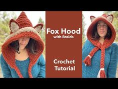 a woman wearing a knitted fox hat and scarf with the words fox hood on it