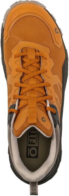 the top view of a pair of orange sneakers