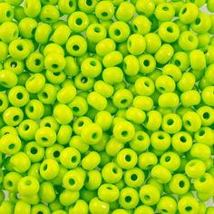 bright green beads with holes in the middle