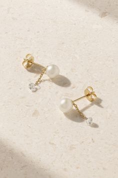 Mizuki creates jewelry that's meant to "move, flow and breathe with the body." These earrings are dotted with the label's signature Akoya pearls at each post, which suspend delicate chains tipped with light-catching diamonds - they sway beautifully as you turn your head. We also have the longer version in our edit. Dainty Yellow Gold Pearl Earrings In Sterling Silver, Delicate 14k White Gold Pearl Earrings, Dainty Yellow Gold Pearl Earrings, Delicate 14k Yellow Gold Pearl Earrings, Yellow Gold Dangle Earrings With Akoya Pearl, Dainty Briolette Yellow Gold Earrings, Dainty Yellow Gold Briolette Earrings, Dainty Akoya Pearl Earrings In Yellow Gold, The Bling Ring